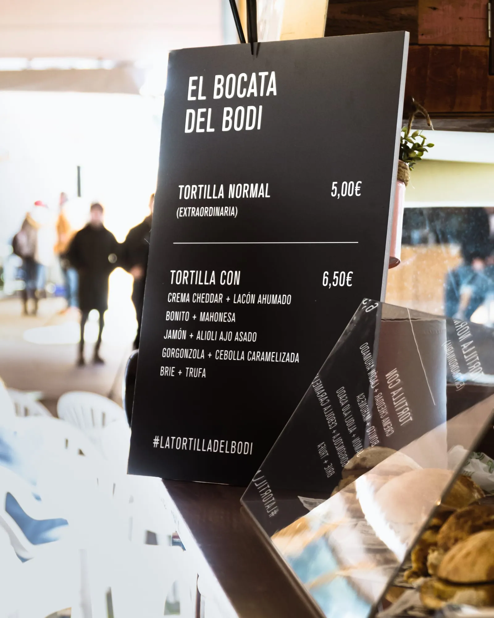 Carta de El bocata del Bodi con sus variedades de tortilla y la etiqueta latortilladelbodi