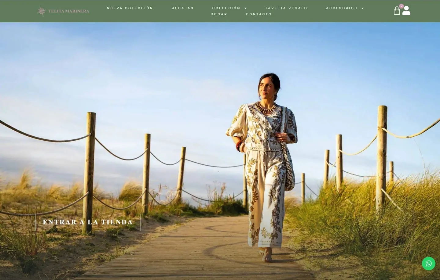 Portada de telitamarinera.com con la modelo caminando por la pasarela de las dunas y el botón Entrar a la tienda